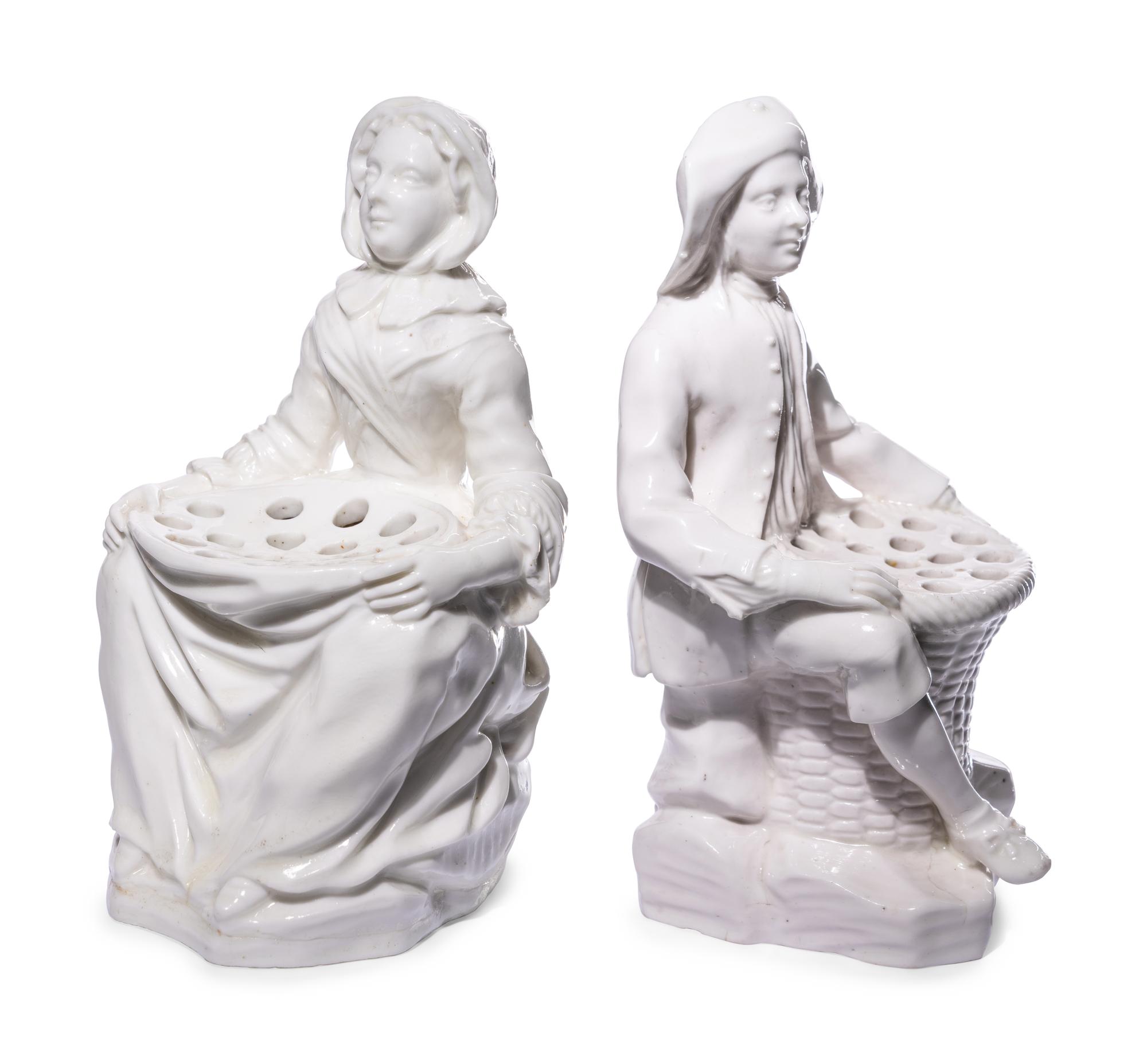 A Pair of French Soft-Paste Porcelain White Bouquetière Figures