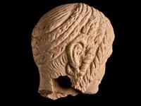 An Etruscan Terracotta Votive Half-Head