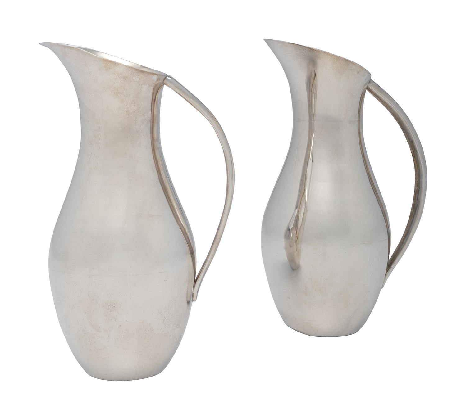 A Pair of Mexican Silver Pitchers