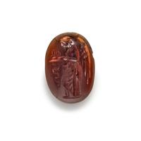A Roman Garnet Ring Stone with the Goddess Nike at an Altar