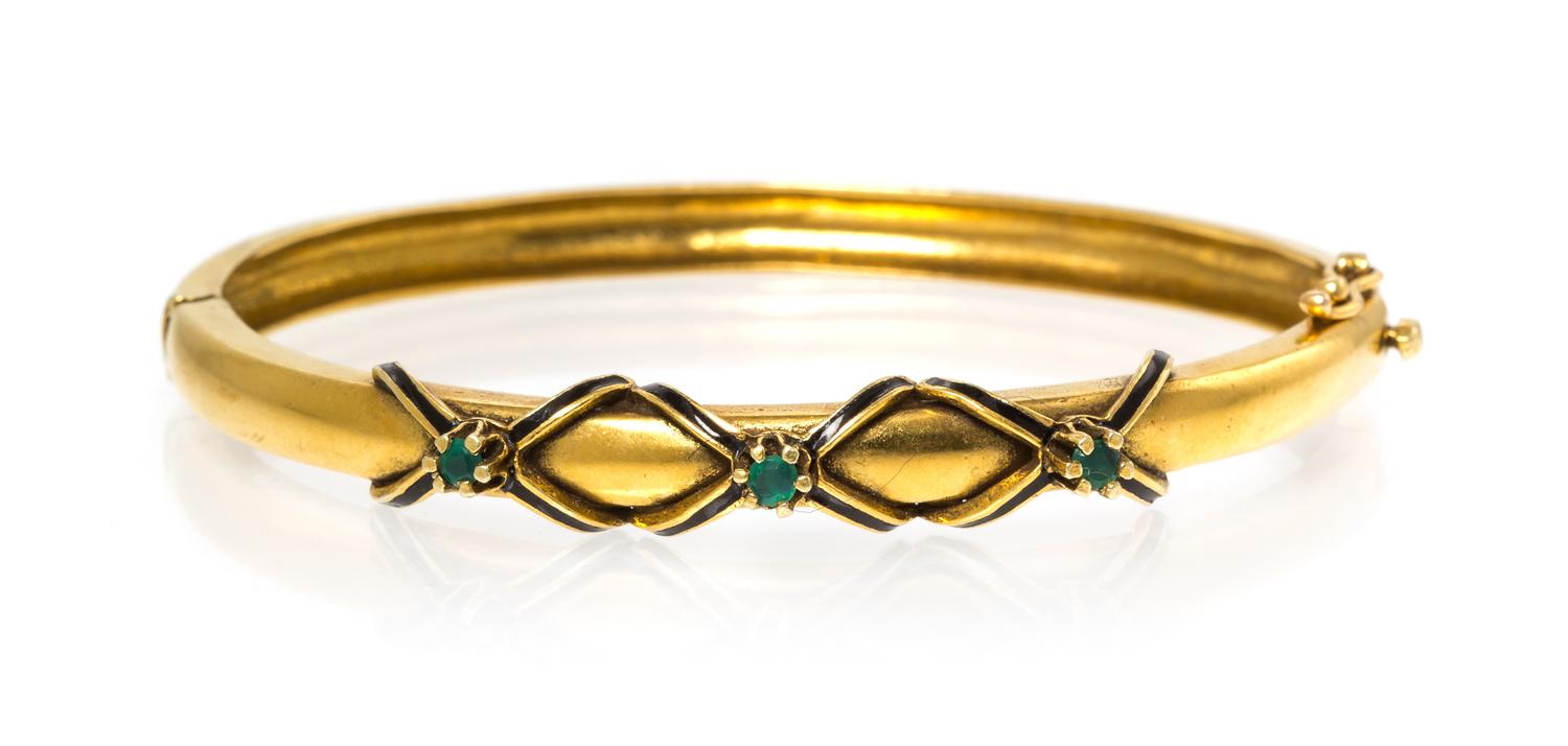 A 14 Karat Yellow Gold, Emerald and Enamel Bangle, 10.90 dwts.