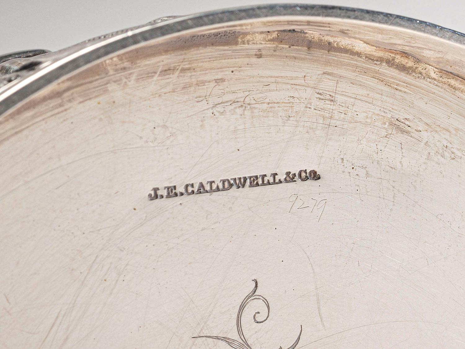 An American Silver Repoussé Chocolate Pot