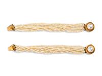 A Pair of 14 Karat Yellow Gold Multistrand Cultured Pearl Bracelets,