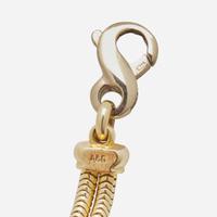 An 18K Tri-Color Gold and Diamond Bracelet