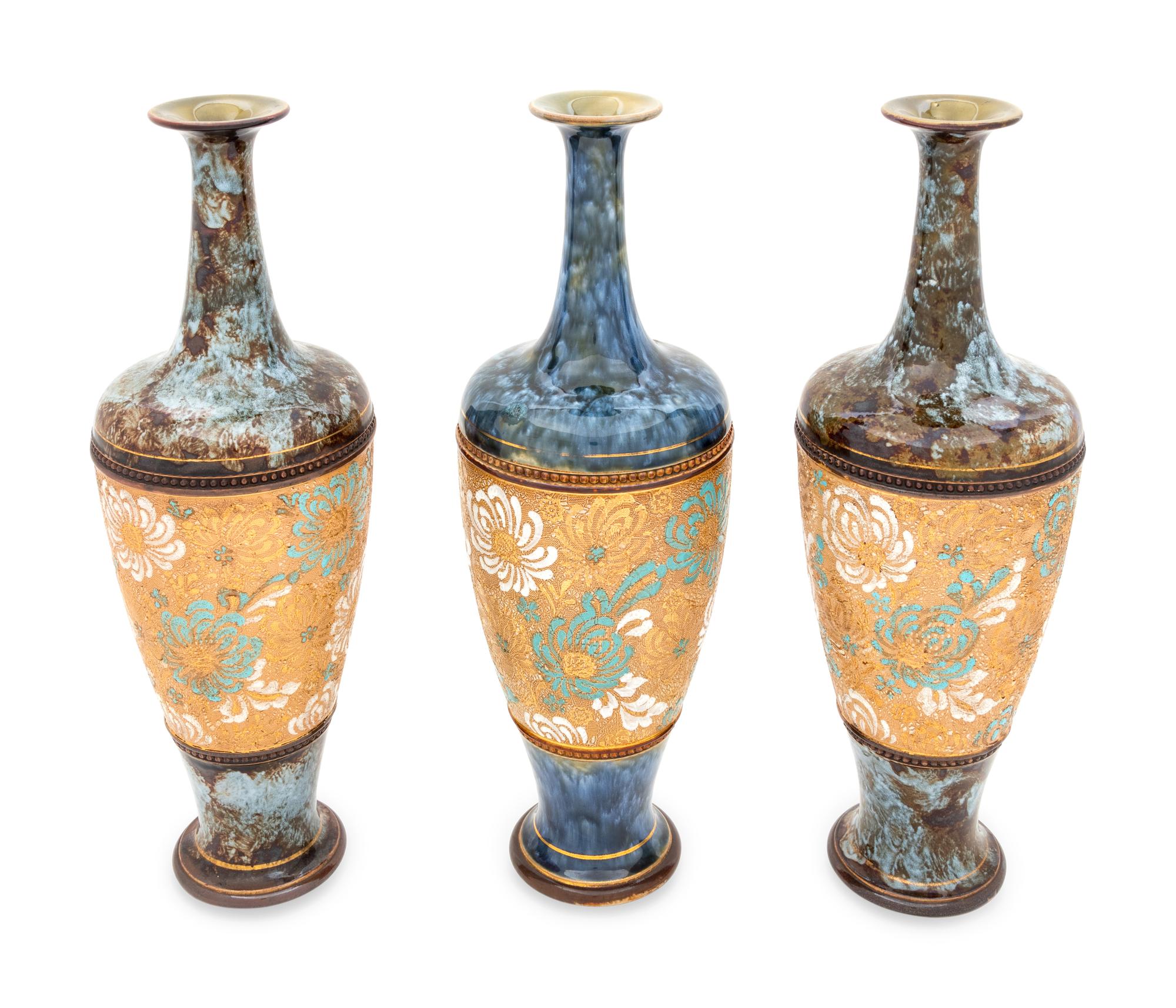 A Royal Doulton and Two Doulton Lambeth Stoneware Vases
