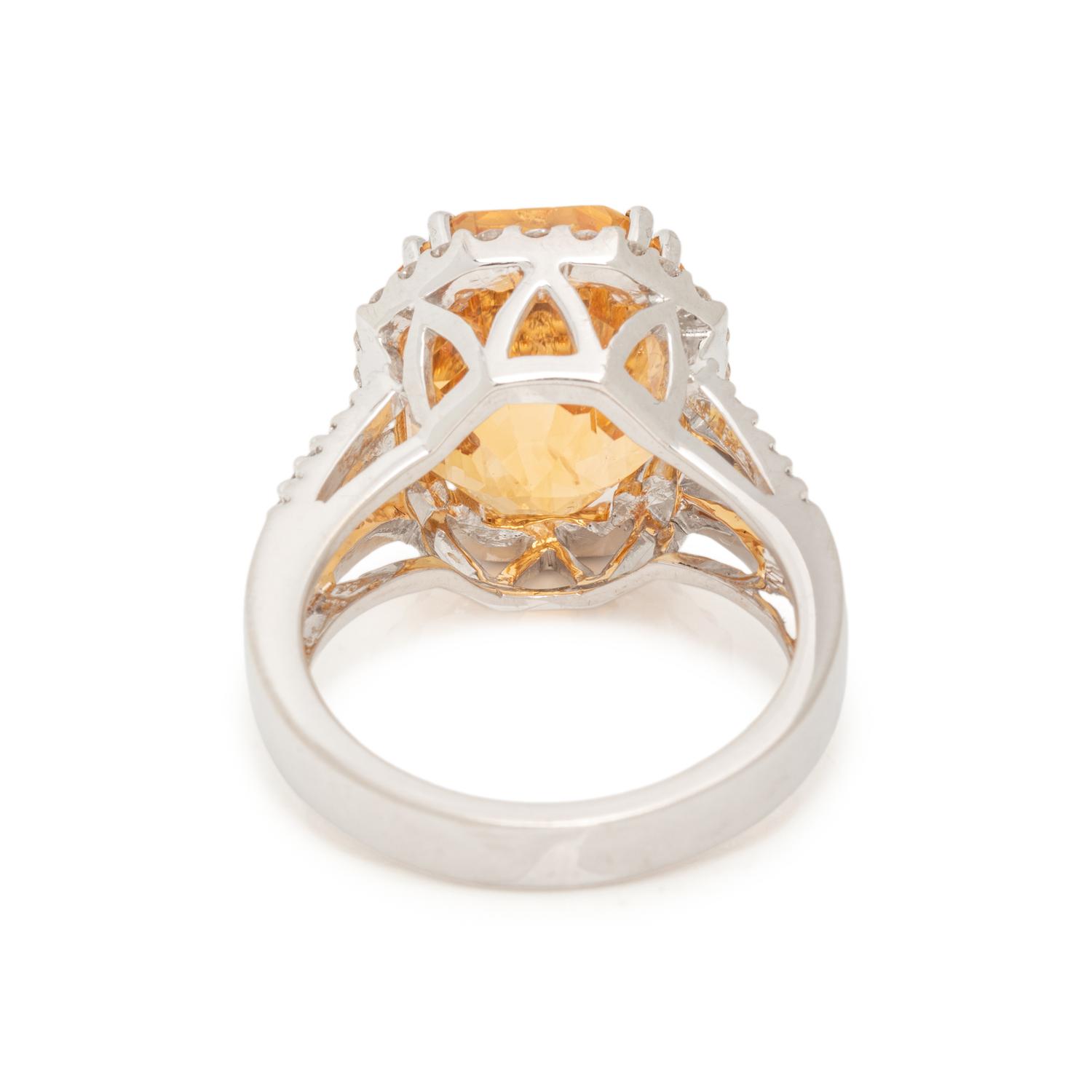 CEYLON, ORANGE-YELLOW SAPPHIRE AND DIAMOND RING