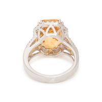 CEYLON, ORANGE-YELLOW SAPPHIRE AND DIAMOND RING