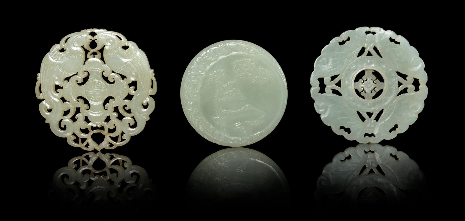 Three Carved Jade Circular Plaques