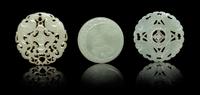Three Carved Jade Circular Plaques