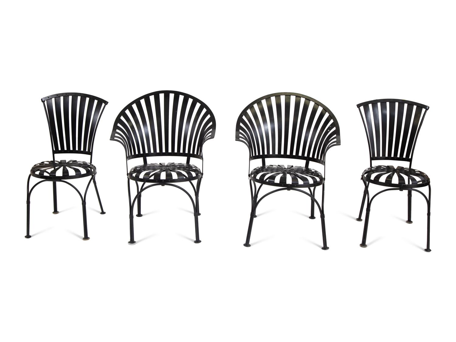 A Spring Steel Garden Table and Eight Chairs by Francois Carre