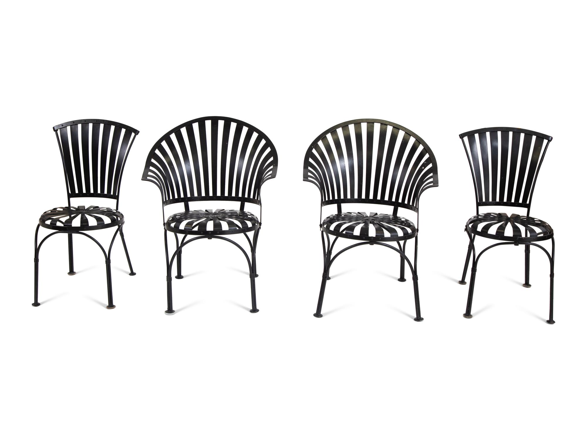 A Spring Steel Garden Table and Eight Chairs by Francois Carre