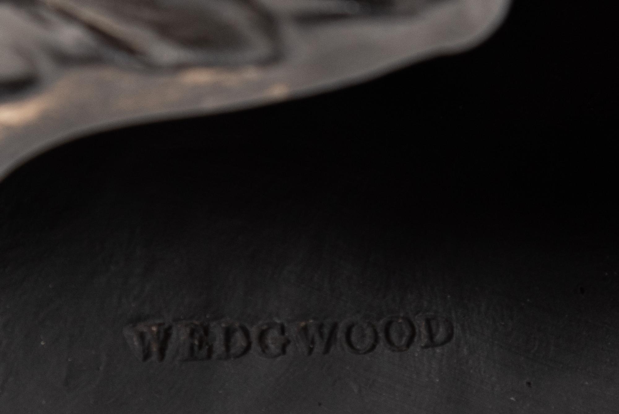 A Pair of Wedgwood Black Basalt Triton Candlesticks