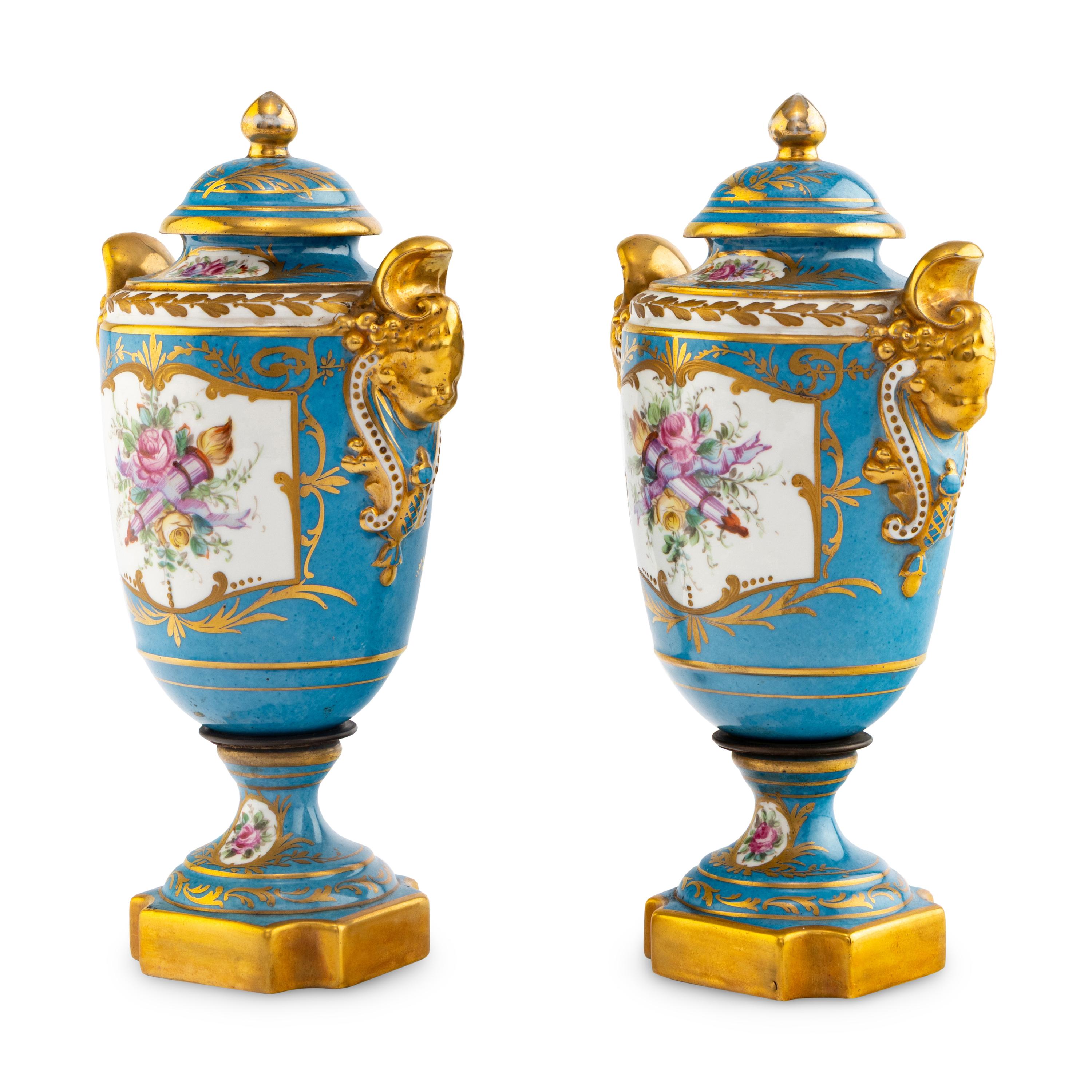 A Pair of Sèvres Style Porcelain Urns