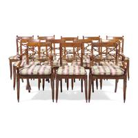 A Set of Twelve Regency Style Fruitwood Dining Chairs