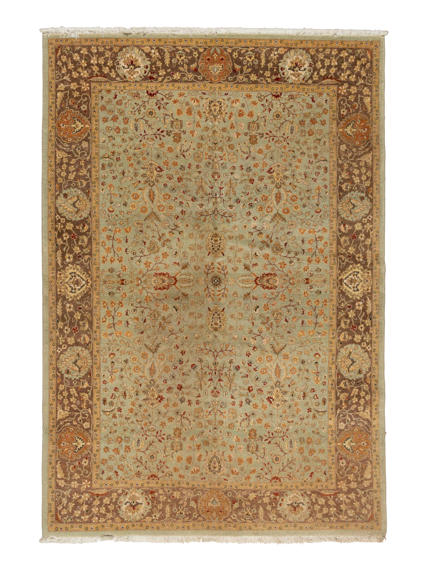 An Agra Design Wool Rug
