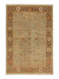 An Agra Design Wool Rug