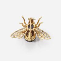 An 18K Yellow Gold and Gemstone Pin