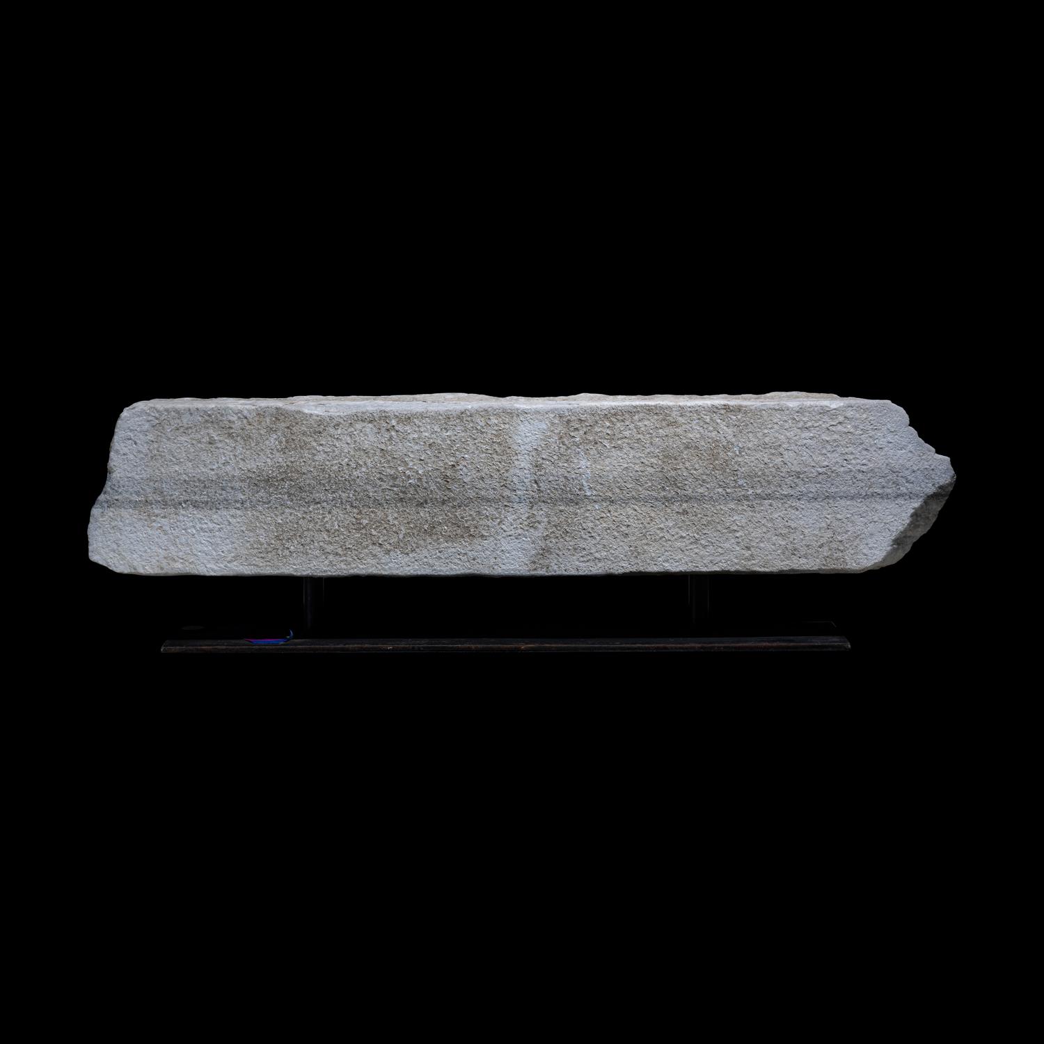 A Roman Marble Frieze Fragment with Heads of Medusa