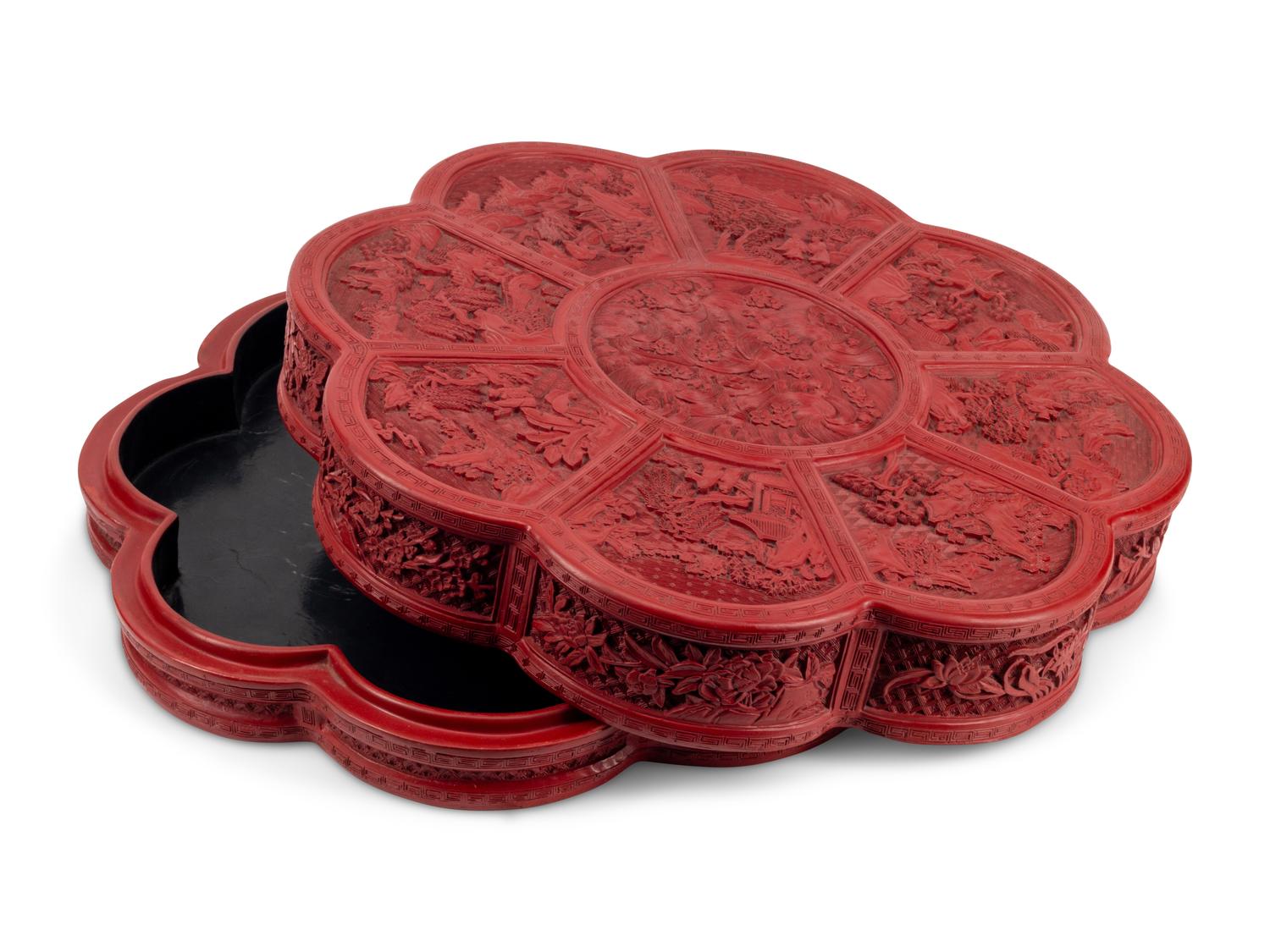 A Large Chinese Carved Red Lacquer Box and Cover