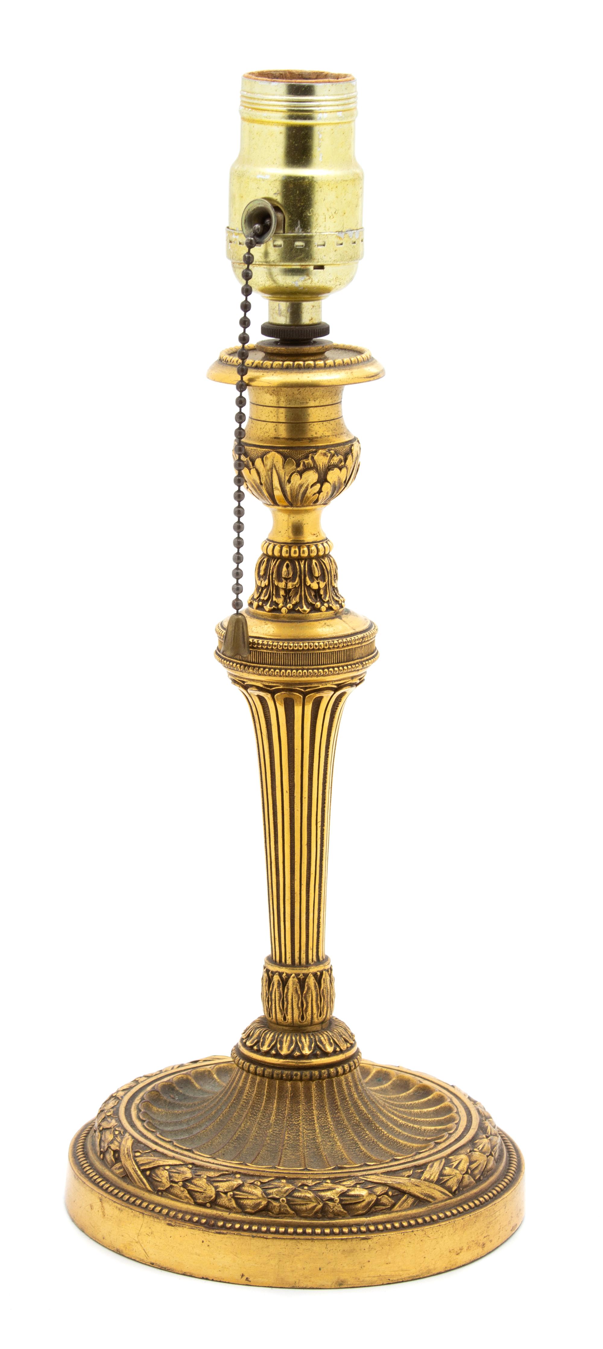 A Louis XVI Style Gilt Bronze Candlestick Height 10 1/4 inches. — LATE 19TH CENTURY
