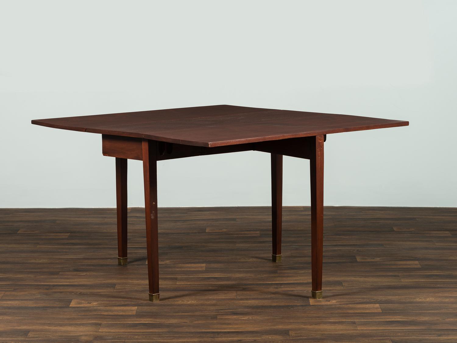 A George III Mahogany Drop-Leaf Dining Table