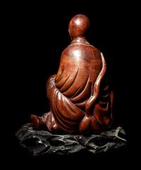 A Chinese Longyan / Lychee Wood Figure of a Luohan