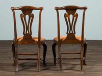 A Set of Six Queen Anne Pierce Carved Mahogany Stretcher Base and Trifid Foot Side Chairs