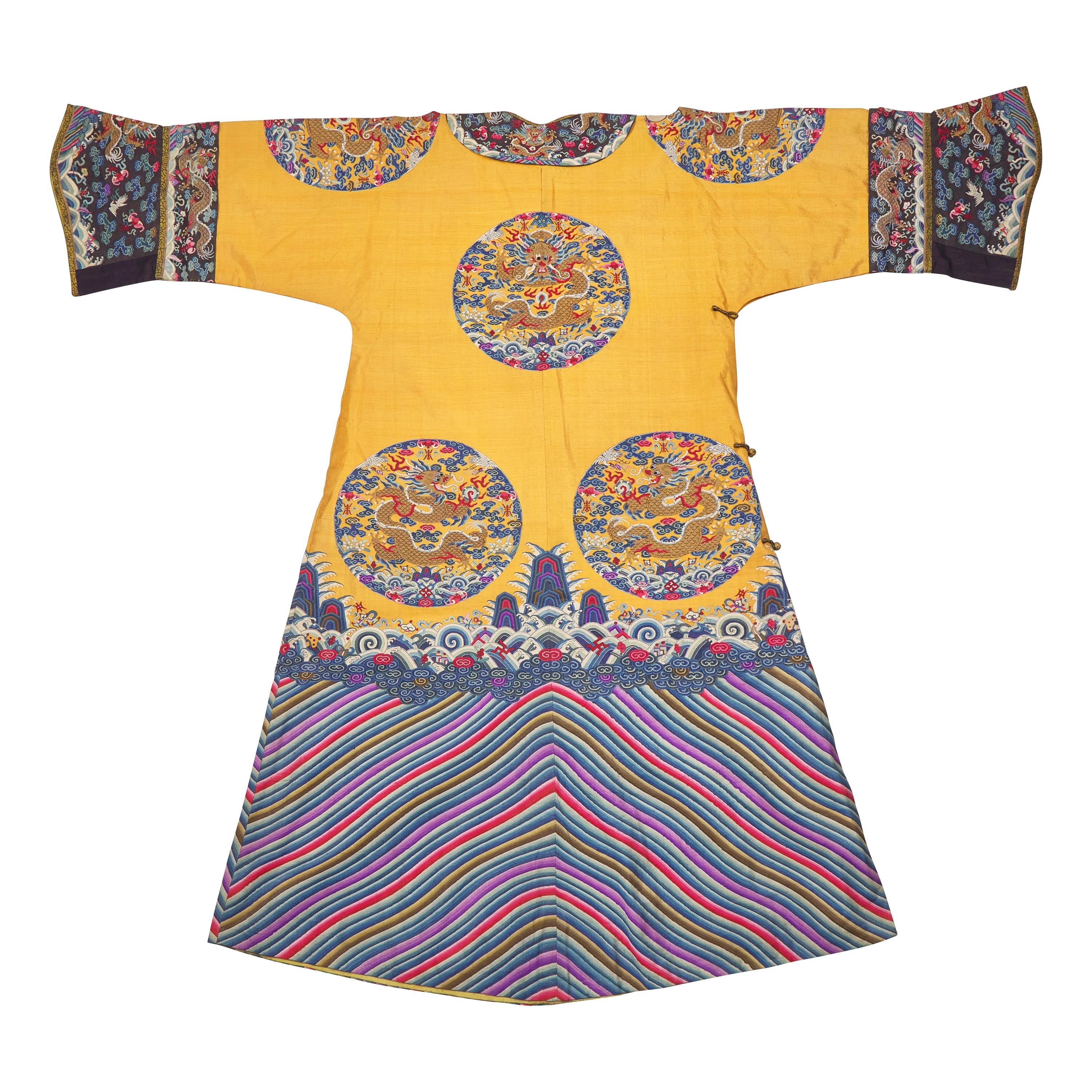 A Chinese Yellow Kesi Dragon Roundel Robe, Late 19th Century 清晚期 黃地緙絲龍袍