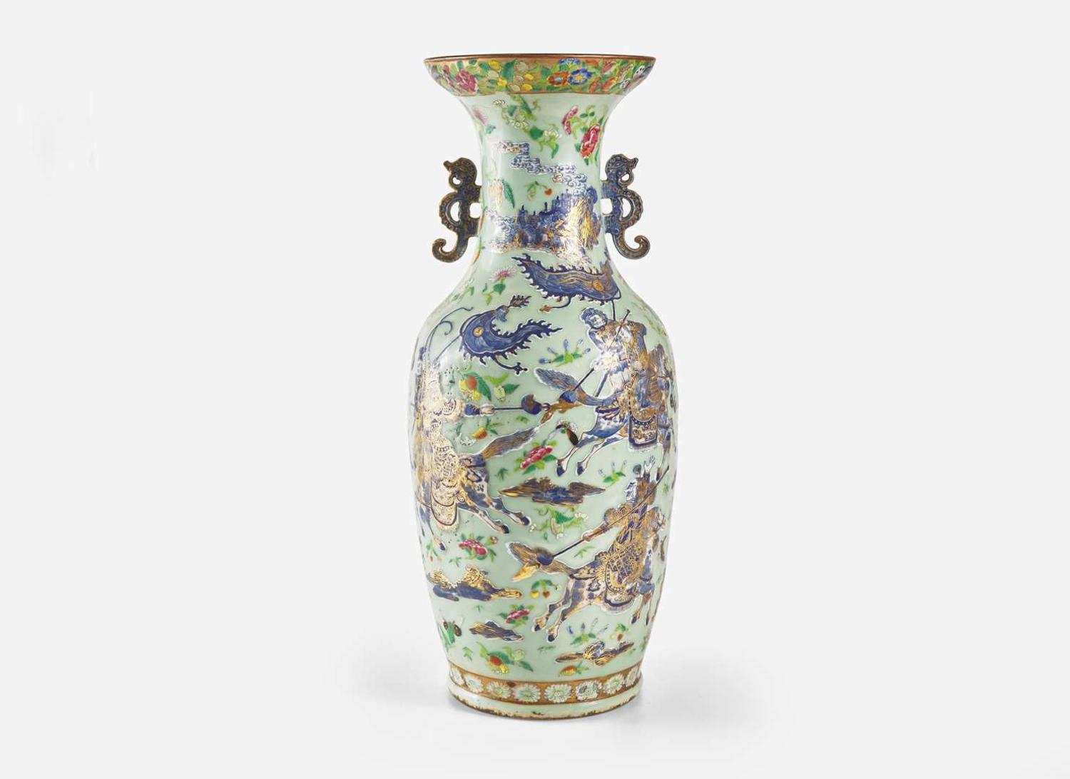 A Chinese famille-rose decorated molded celadon ground vase, 19th century 粉青地粉彩模印貫耳瓶 十九世紀