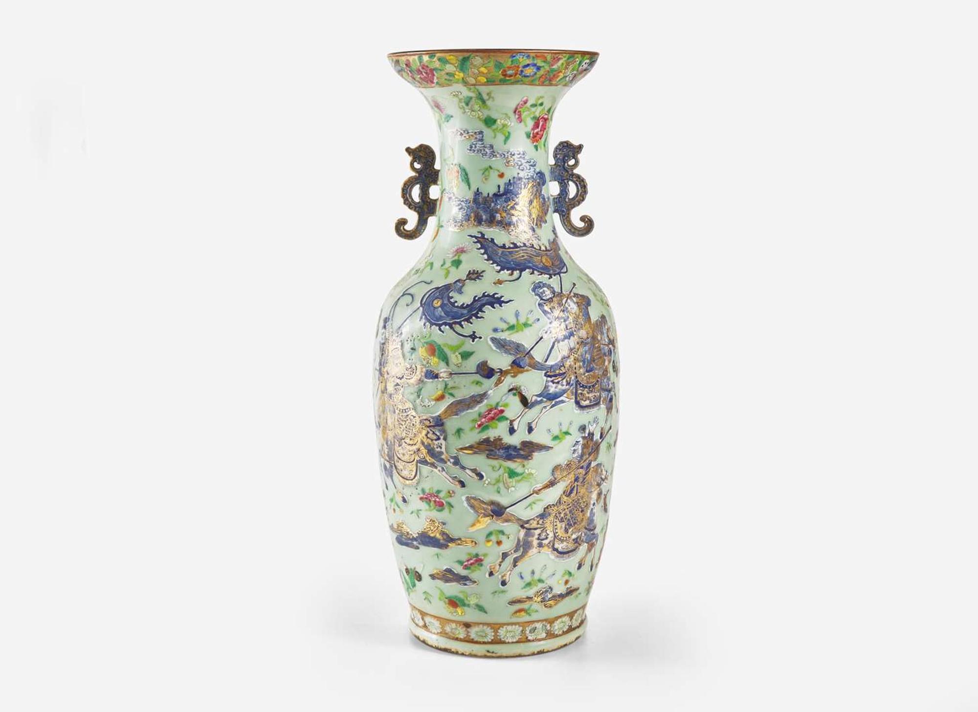 A Chinese famille-rose decorated molded celadon ground vase, 19th century 粉青地粉彩模印貫耳瓶 十九世紀