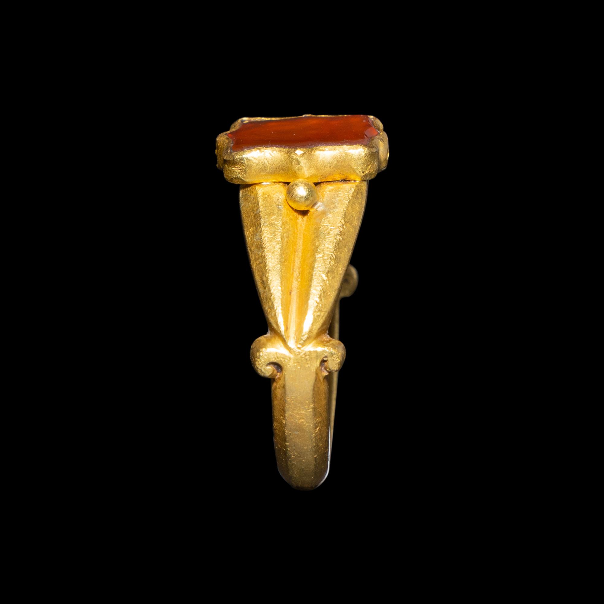 A Migration Period Gold and Spessartine Garnet Ring