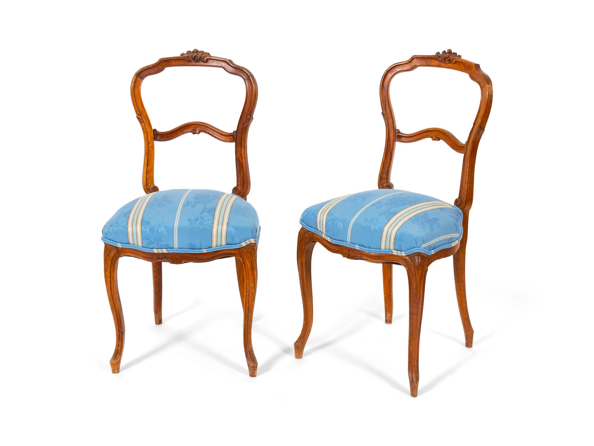 A Pair of Victorian Carved Walnut Lady's Chairs