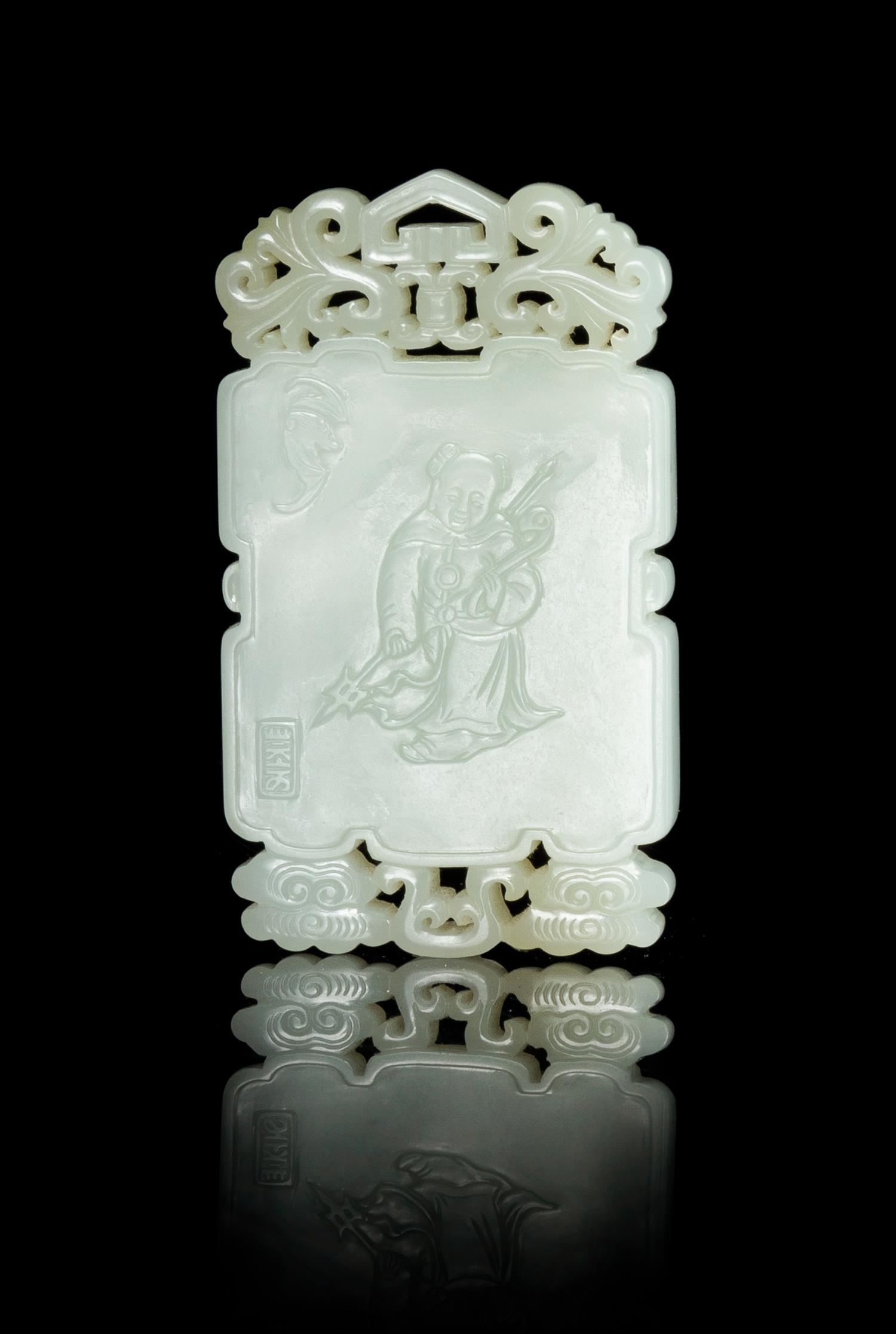 A Carved Pale Celadon Jade Plaque