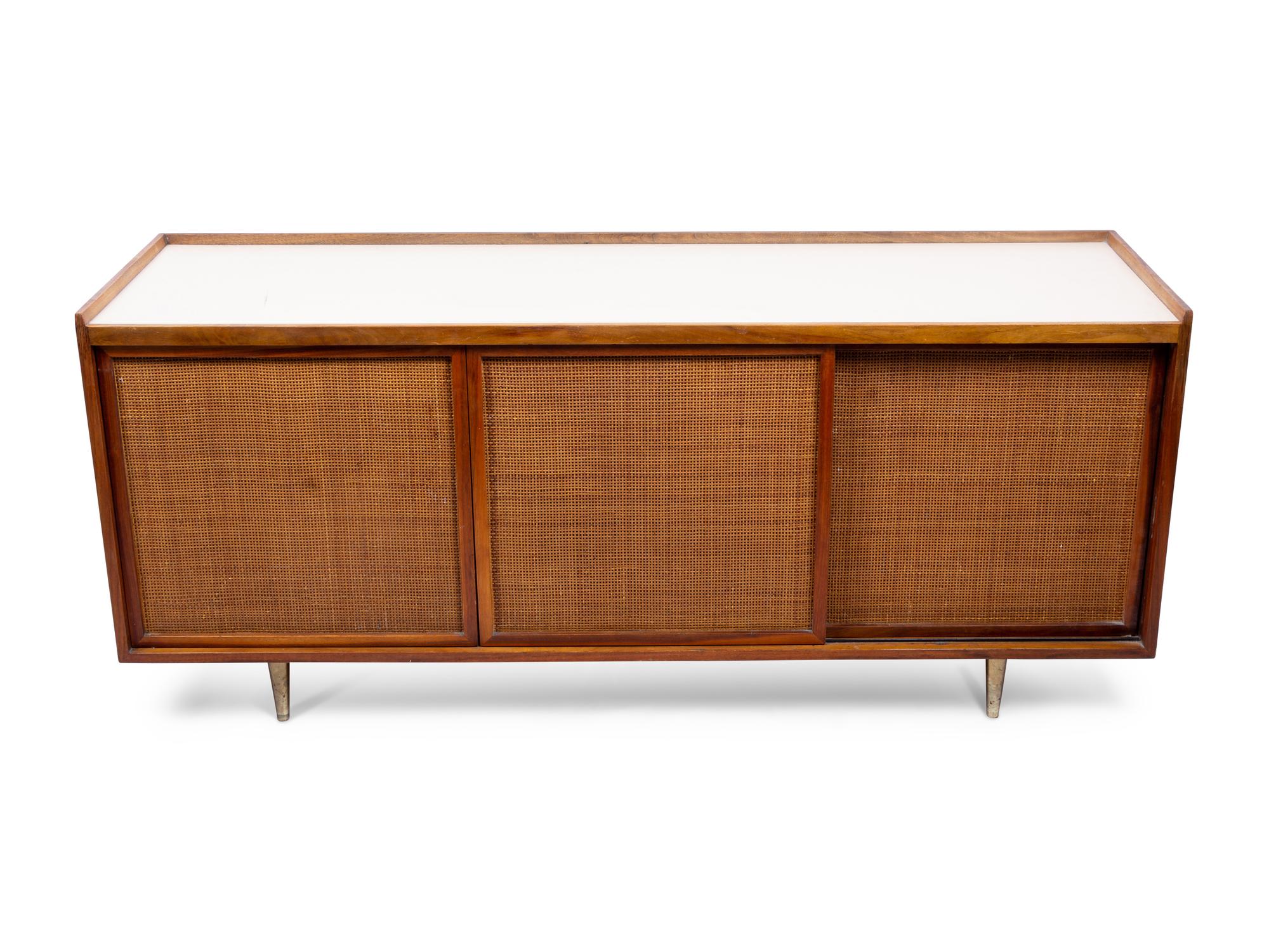A Founders Furniture Co. Walnut, Caned and Laminte-Top Credenza