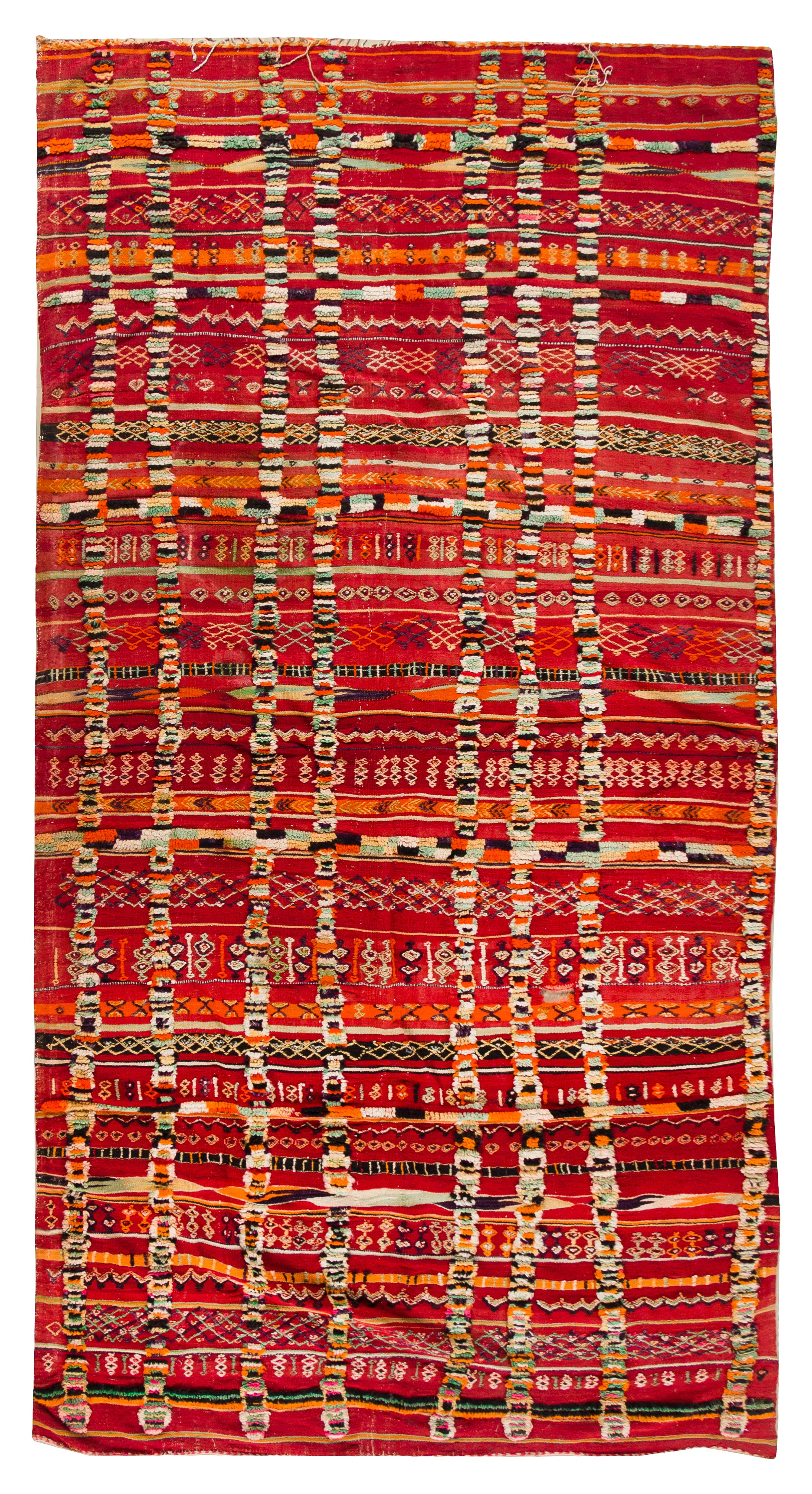 An Afghan Wool Rug 11 feet 1 inch x 5 feet 6 3/4 inches. — 20TH CENTURY
