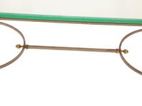 A Neoclassical Style Steel and Brass Glass Top Coffee Table in the Manner of Maison Jansen