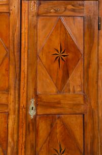 A Continental Olivewood Armoire