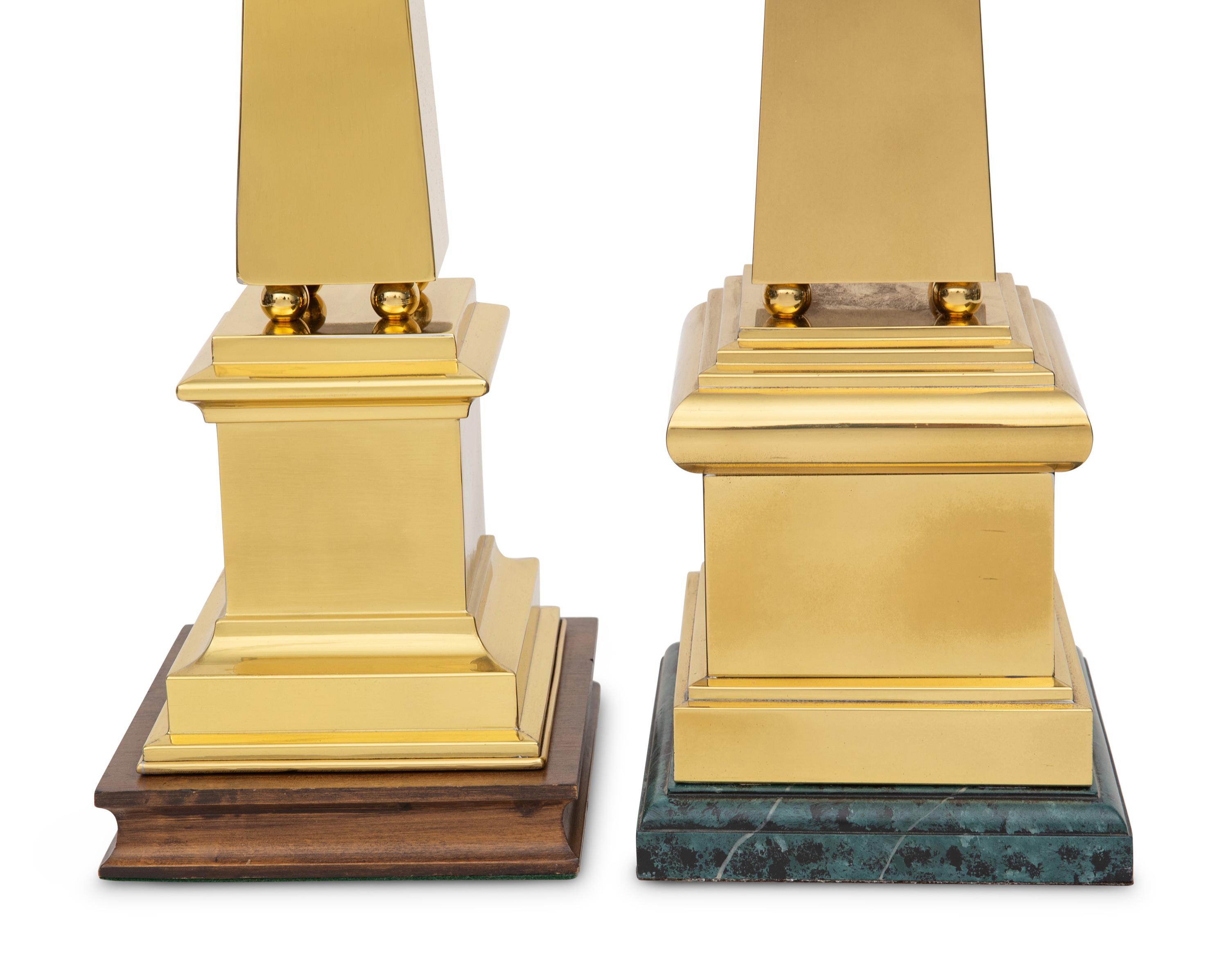 Two Polished Brass Obelisks