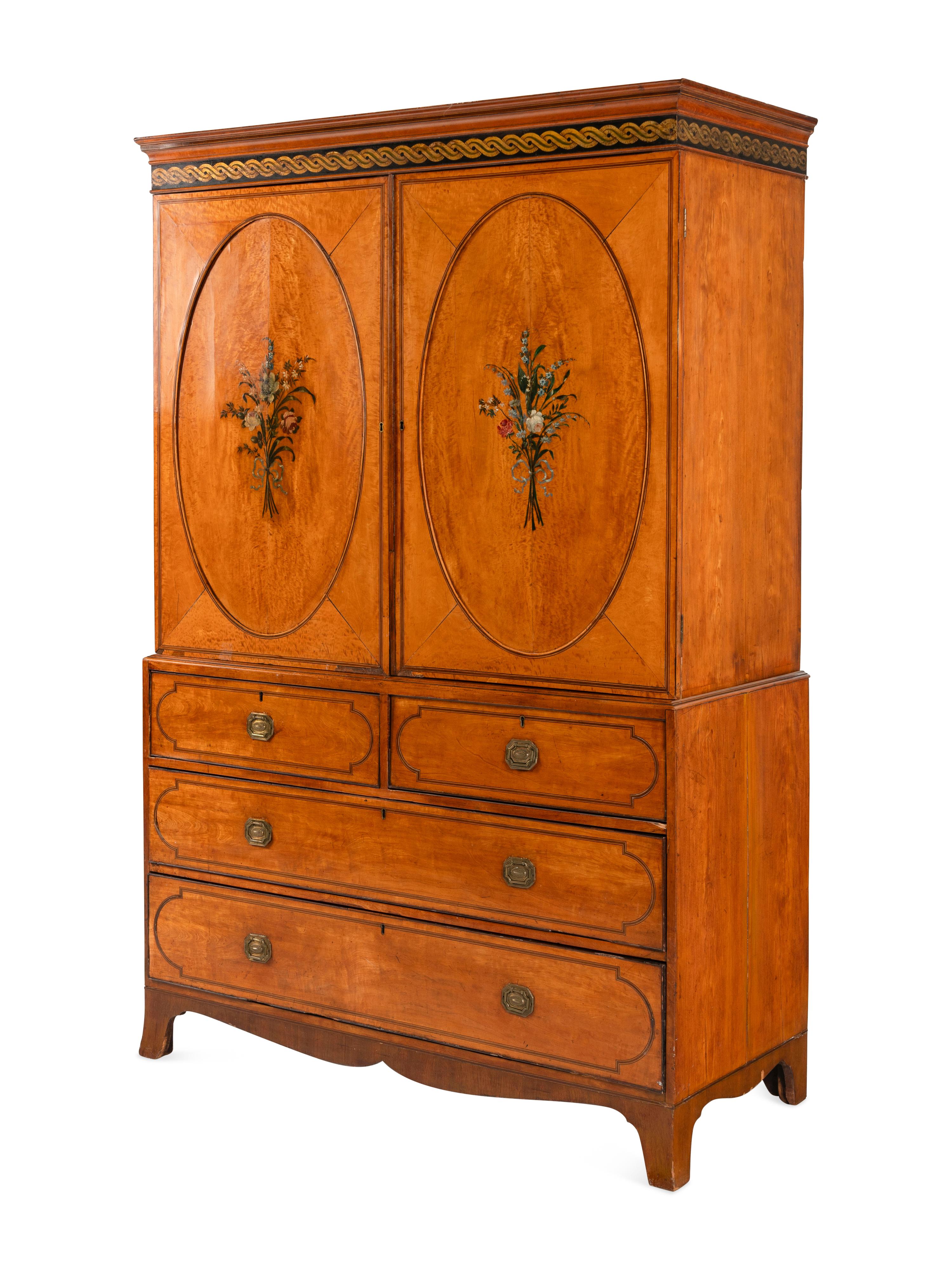 An Edwardian Painted Satinwood Linen Press