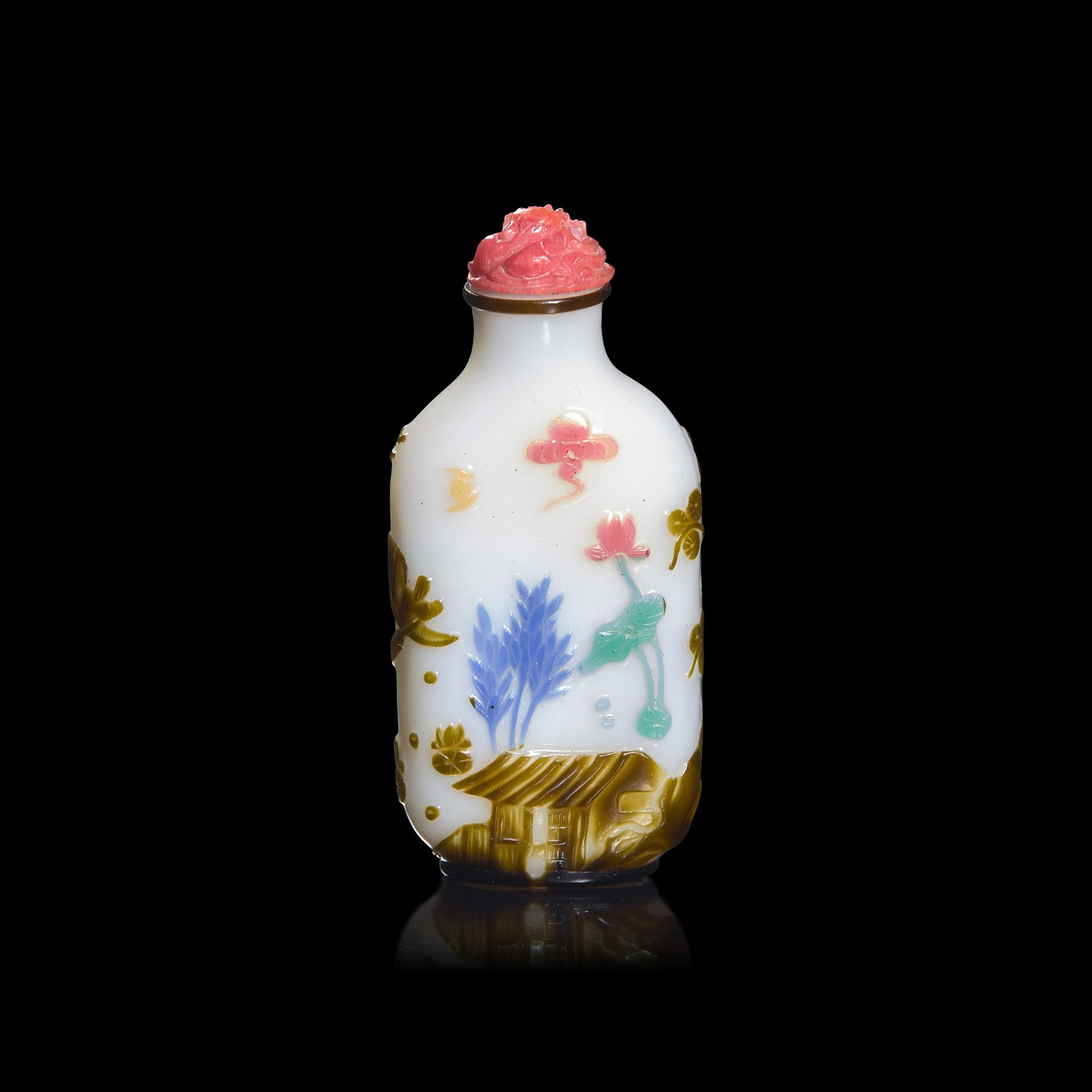 A Chinese Yangzhou Type Carved Multicolor Overlaid Glass Snuff Bottle