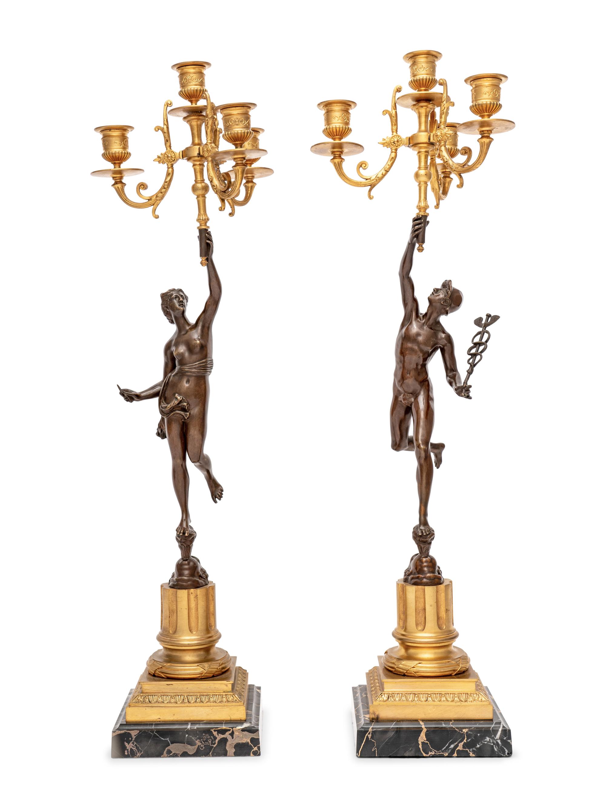 A Pair of Gilt and Patinated Bronze Figural Four-Light Candelabra