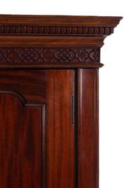 An Edwardian Mahogany Armoire in the Chippendale Taste