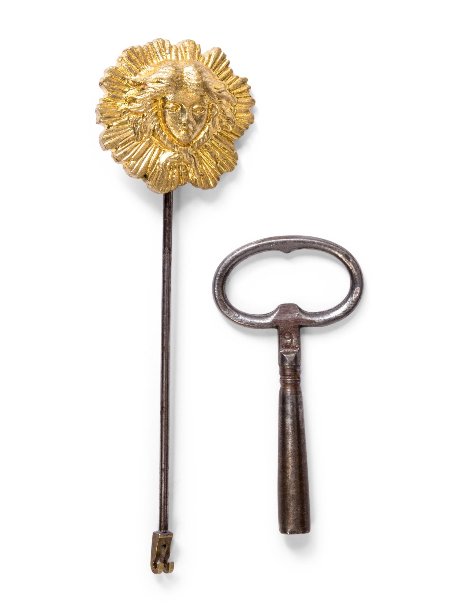 A French Gilt Bronze and Marble Figural Mantel Clock