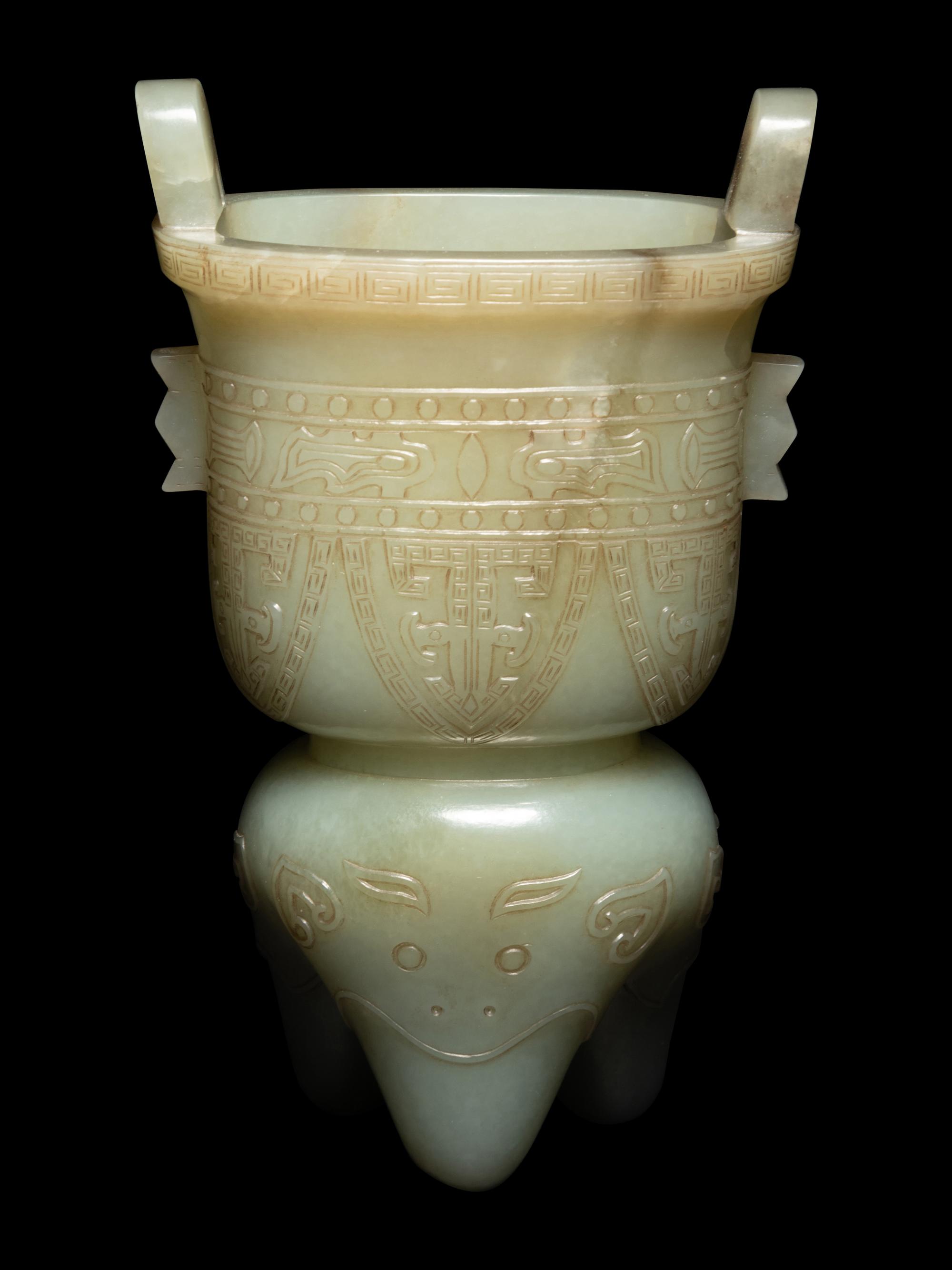 A Russet and Celadon Jade Li -Form Vessel