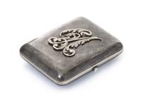 A Russian Niello Silver Cigarette Case, Mark likely of Gustav Klingert, Moscow, late 19th/early 20th century, the lid with an applied m