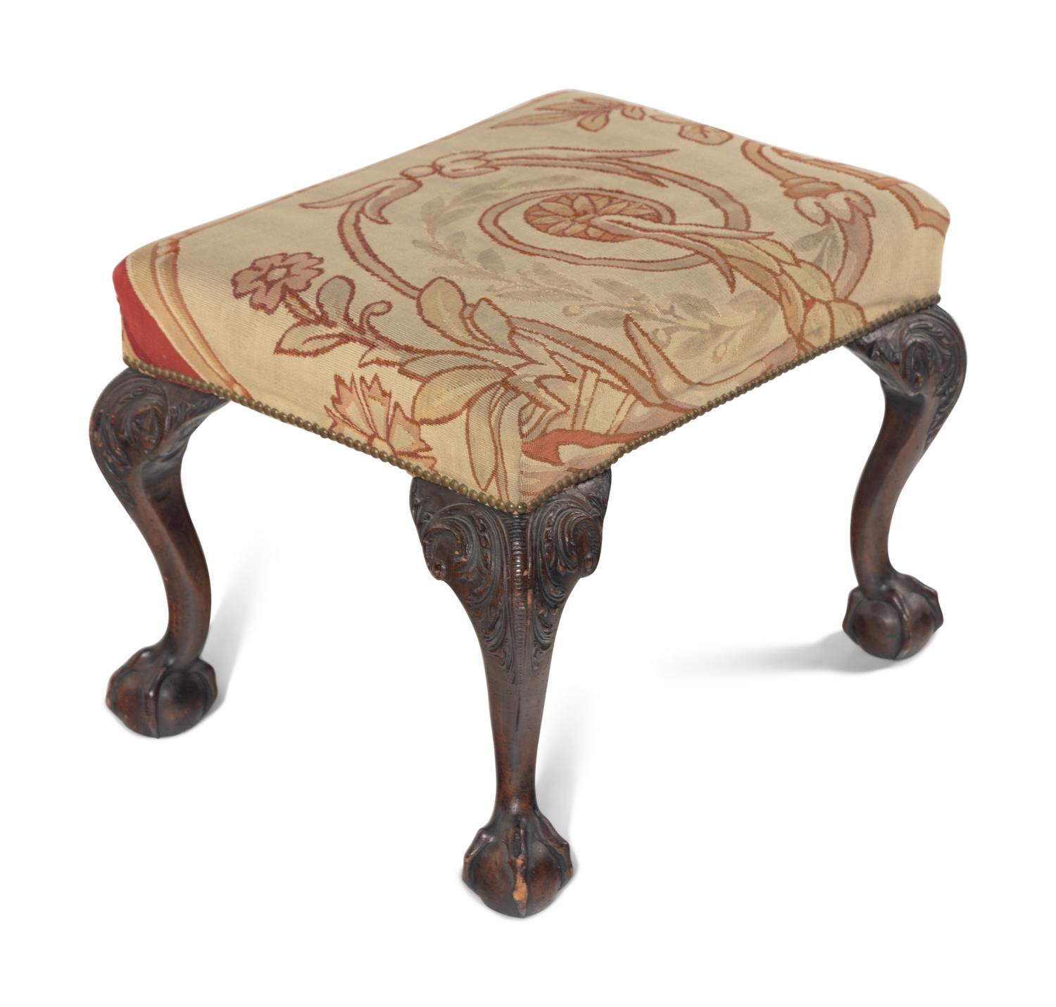 A George III Carved Mahogany Stool