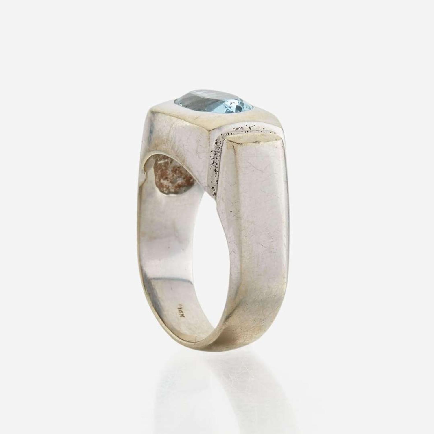 A fourteen karat white gold contemporary aquamarine ring