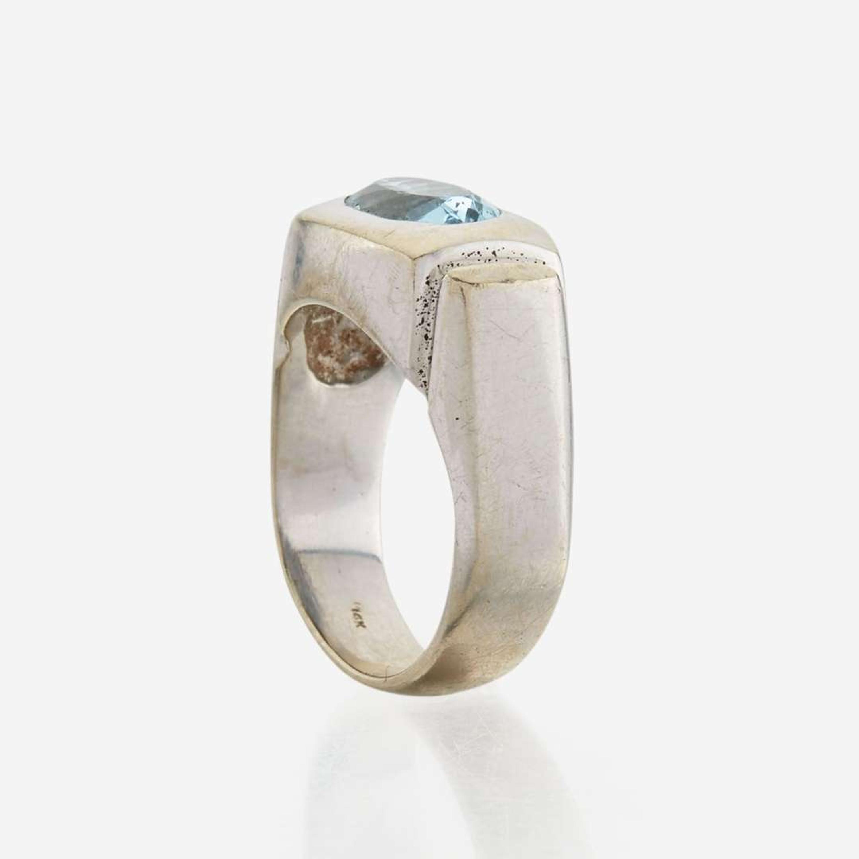 A fourteen karat white gold contemporary aquamarine ring