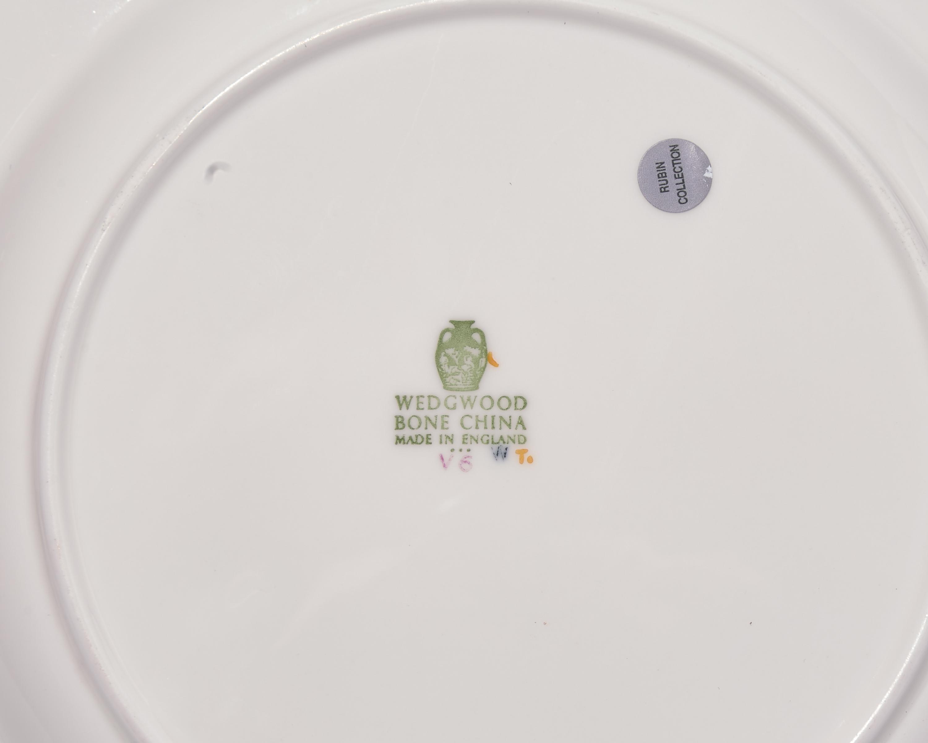 A Wedgwood Parcel Gilt Porcelain Dinner Service