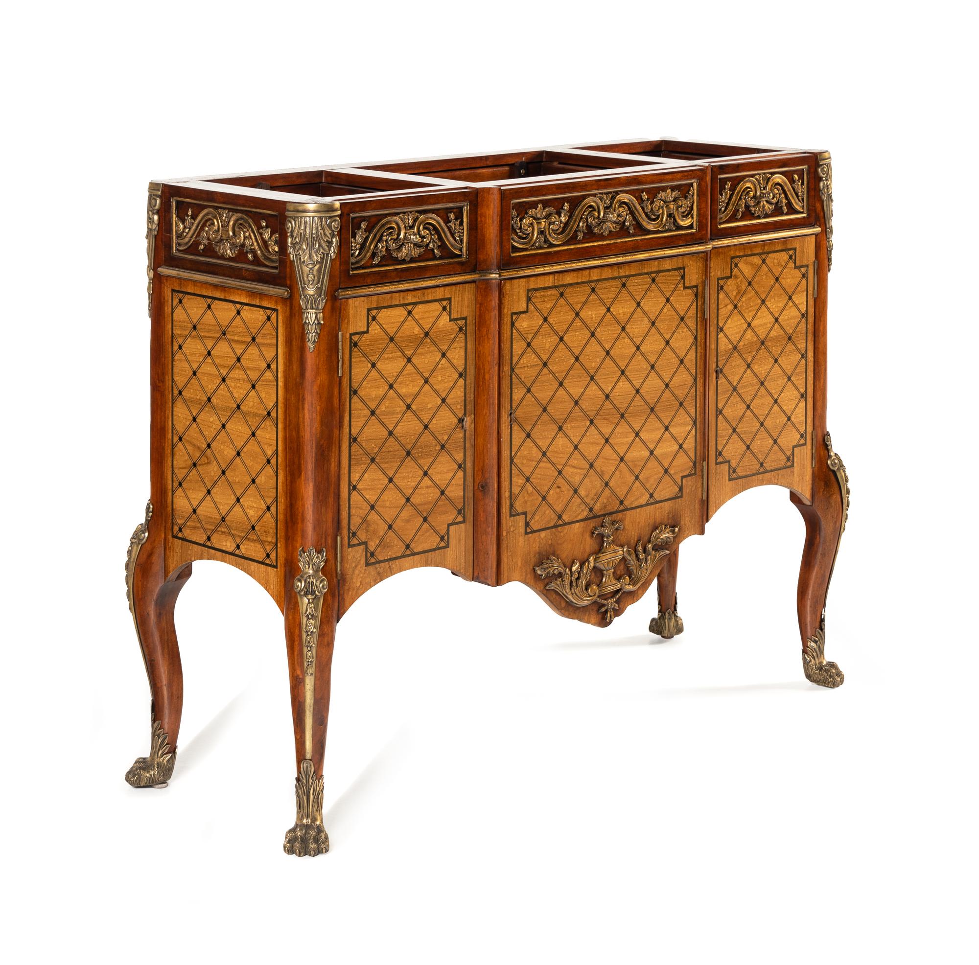 A Louis XV/XVI Transitional Style Gilt Bronze Mounted Marquetry Commode
